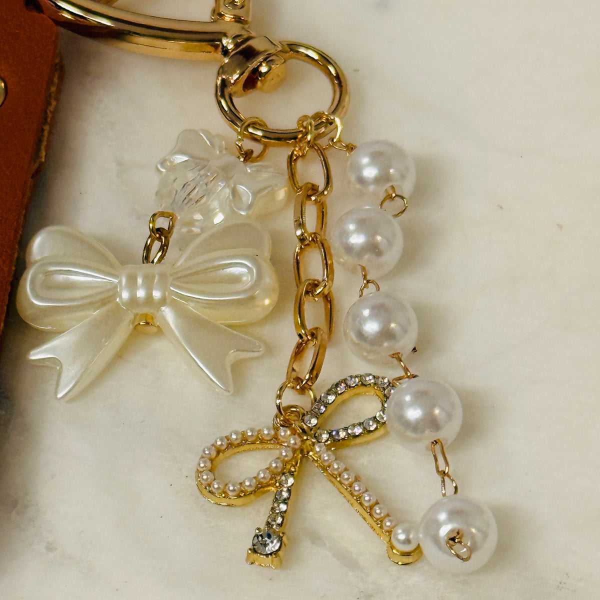 Heart clasp bag charm keychain with brown leather loop