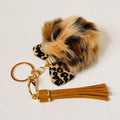 Porte-clés pompon à nœud imprimé léopard | Bijou de sac en fausse fourrure