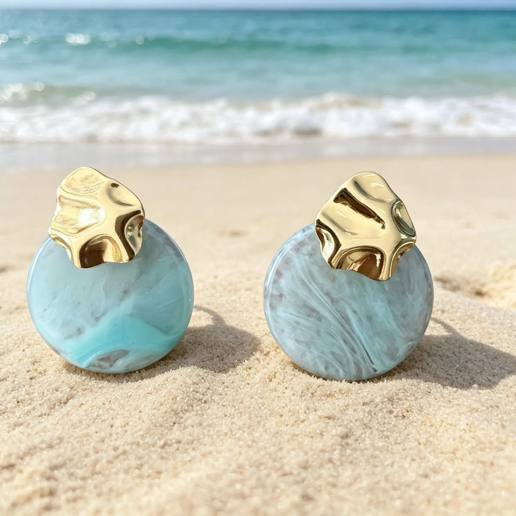 Boucles d'oreilles clous géométriques dorées