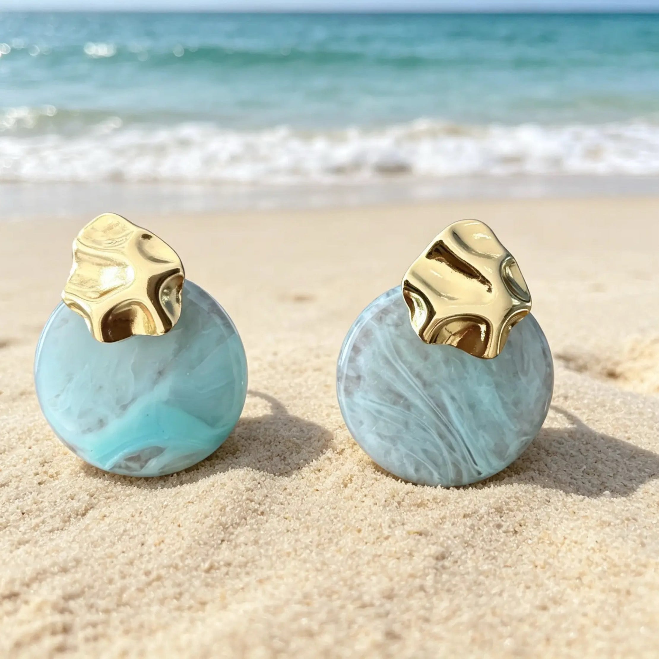 Boucles d'oreilles clous géométriques dorées